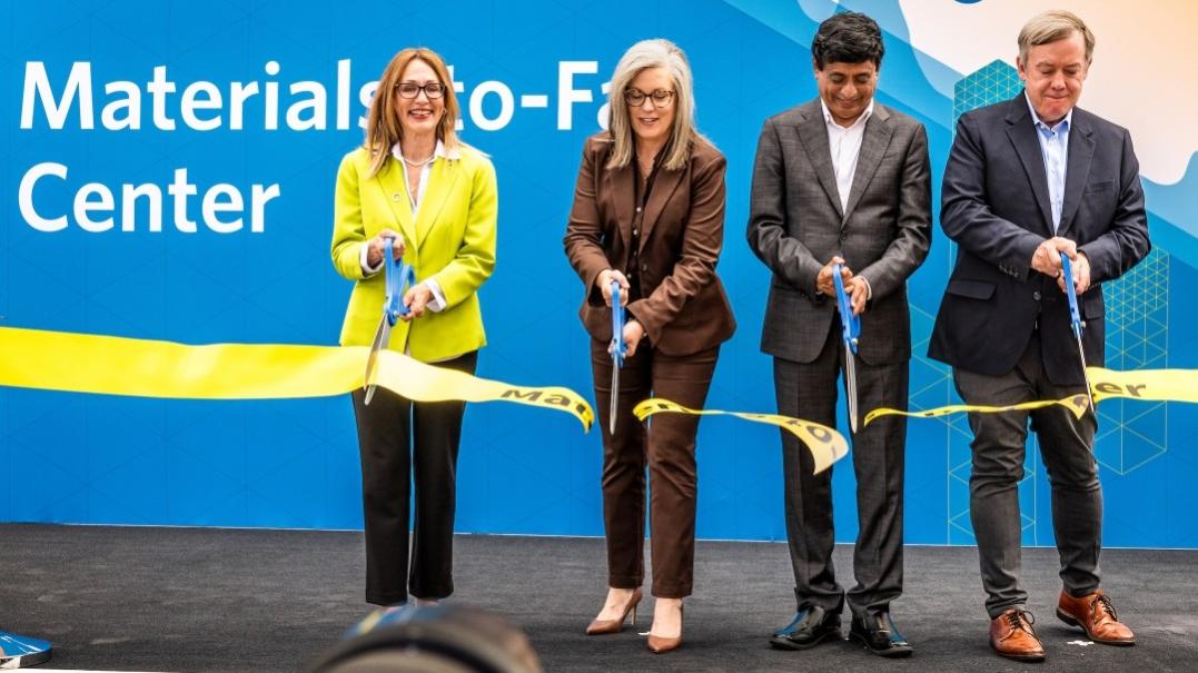 Photo of the ribbon-cutting ceremony with Sandra Watson, president and CEO of the Arizona Commerce Authority; Arizona Gov. Katie Hobbs; Prabu Raja, president of Applied Materials' semiconductor products group; and Arizona State University President Michael Crow cutting the ceremonial ribbon. at the opening celebration of the Materials-to-Fab Center