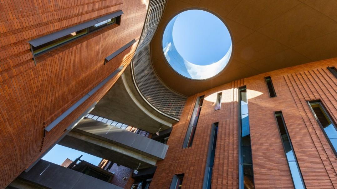McCord Hall, home to the W. P. Carey School of Business, with the photo showing a skylight between the buildings