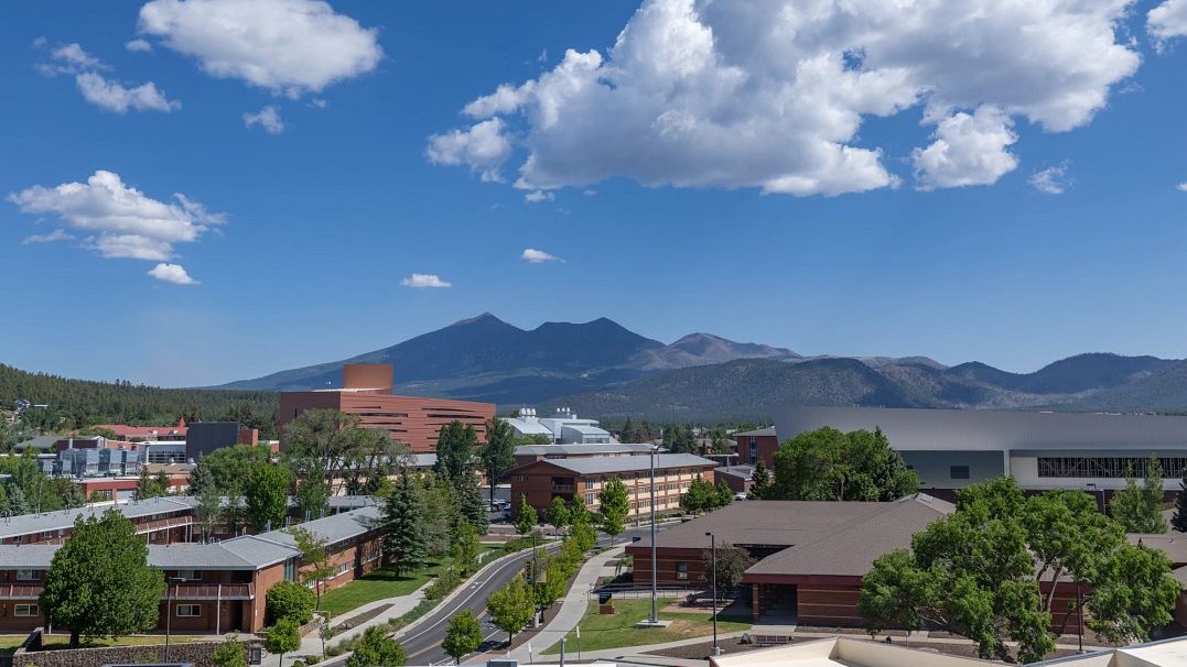 Aerial view of campus with San Francisco Peaks in background 
