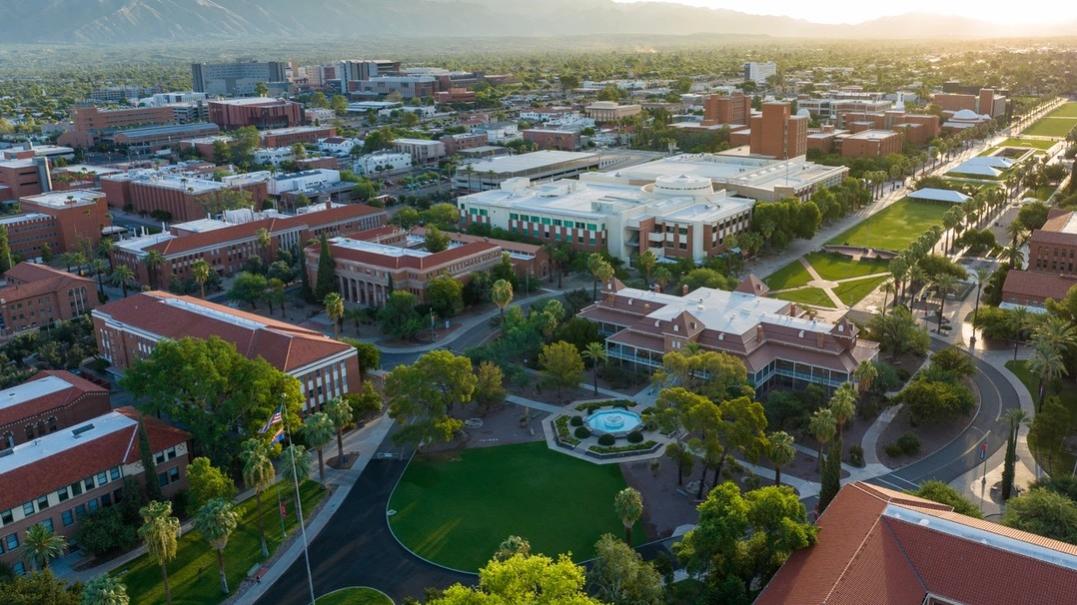 Aerial image of the campus with setting sun the background 