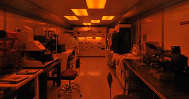 Photo of a lab in orange light. 