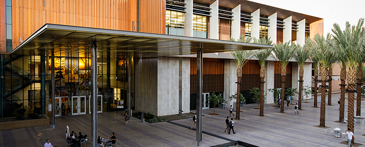 Photo of ASU campus outside of Memorial Union with students walking on the mall 