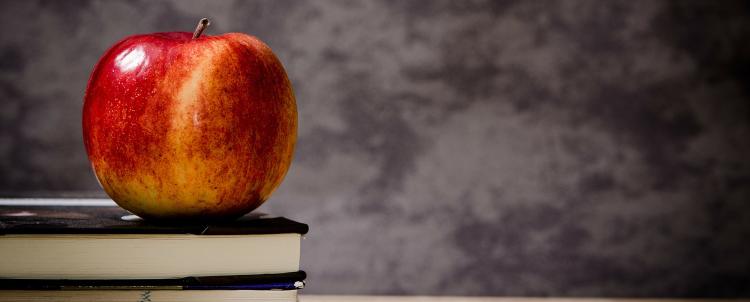 Apple on teacher's desk